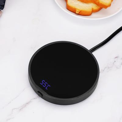 China Customized Hot Selling Electric Logo Temperature Control Heated Coffee Mug Mug Heater Desktop Winter Electric Filling Heater for sale