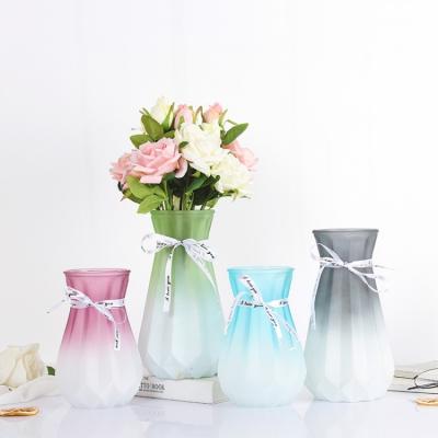 China Modern Lower  price pumpkin frosted gradually colored glass vase flower inserter for home office wedding festival  party decoration for sale