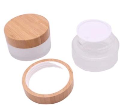 China Cosmetic glass jar for skin care cream jars 30g 30ml Environmental Bamboo Lid Frosted Glass Bottle Cream Jars Empty Cosmetic Container for sale