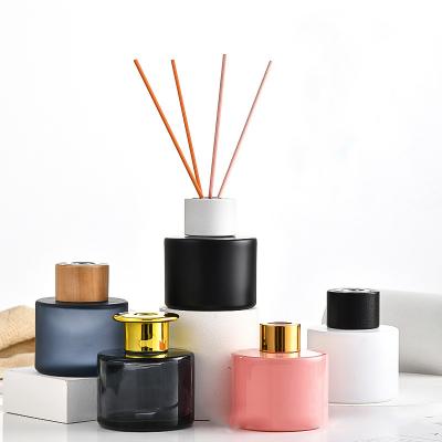 China Glass Diffuser Bottle Wholesale 100ml 200ml 250ml Luxury Empty Round Black Matte Aroma Glass Reed Diffuser Bottle for sale