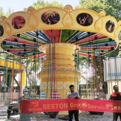 China Amusement Room Beston Amusement Park Project In Uzbekistan Double Platform Carousel Ride Chair Flight Ride Ride Roller Coaster for sale