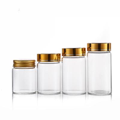 China Wholesale Food High Borosilicate Transparent Memory Tube Glass Tube Type Bottle With Gold Lid for sale