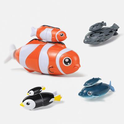 China Screw Electric New Product Electric Light Up Bath Clownfish Dolphin Octopus Dolphin Penguin Swimming Animal Toys Light Up Bath Toy For Kids for sale