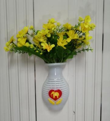 China New PVC Wall Hanging Magic Cup Suction Vase Modern Decoration Vase For Home Decor for sale