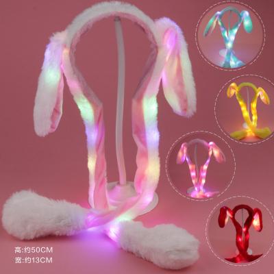 China Factory Supply Women And Girls Bunny Ear Moving Jumping Rabbit Hat Ear Flap Funny Animal Hat With LED for sale