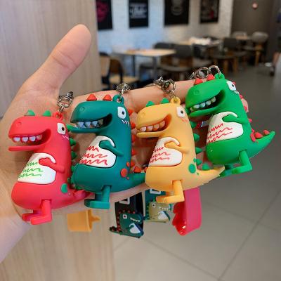 China Fashion 3D PVC Dinosaur Key Chain Car Key Chain Casual Rubber Doll Wholesale Casual Bag Pendant Key Chain with Wrist Strap Girl Gift for sale