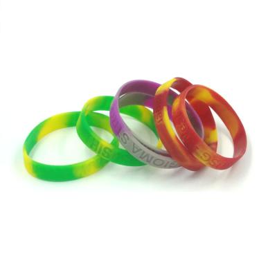 China Wholesale Custom Popular Debossed Embossed Logo Silicone Swirl Bracelet Without Infilled Color for sale