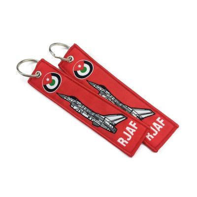 China Viable Key Chain Wholesale Embroidered Key Chain Ring Jewelry Car Key Chain Aviation Gifts Luggage Tag Label Badges for sale