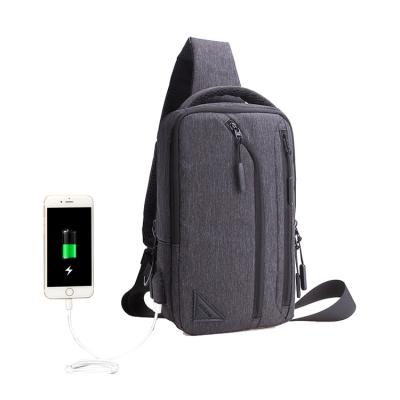 China Outdoor Water Resistant Oxford Travel USB Charging Small Cross - Body Sling Fashion Trunk Bag for sale