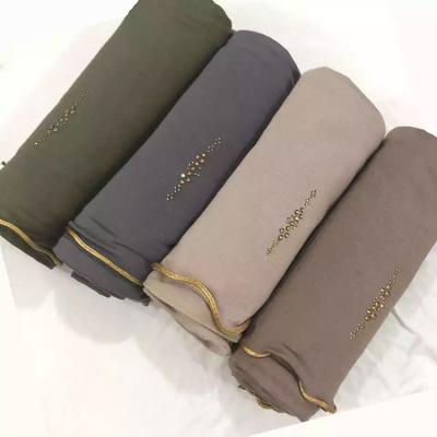 China Satin line pressing hot piercing stone women satin line 2021 new hot muslim piercing design pressing cotton tank top Hijab scarf shawl for sale