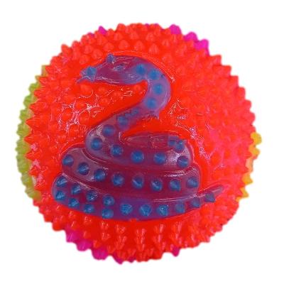 China Eco-Friendly Material Flashing Balls Toys 7.5cm Flamingo LED Light Up Skull Design Stress Squeak Balls Massasge Bounce Spiky Balls Unisex Wholesale for sale