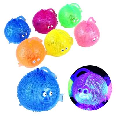 China Relieve effort flashing brought fish with rope balls toys for unisex wholesale colorful squeaker squeaker kids rope animal balls unisex for sale