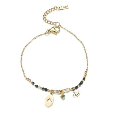 China Environmental Friendly Hot Selling Gold Plated Stainless Steel Compass Charm Bracelet Evil Eye Hollow Rice Beaded Bracelet for sale