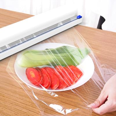 China Sustainable Suction Cup Household Fresh Food Fruit Cling Film Cutter Household Products For Kitchen for sale