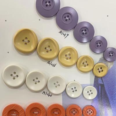 China Color 4 Hole Plastic Button Black Metal Arcylic Plastic ABS Textile Industry for sale