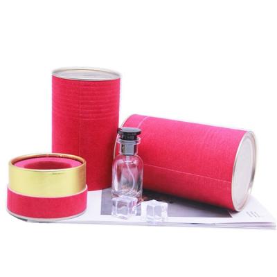 China Handmade Custom Logo Perfume Packaging Gift Box Round Cardboard Tube Box With Plastic/EVA/Sponge Inner Tray for sale