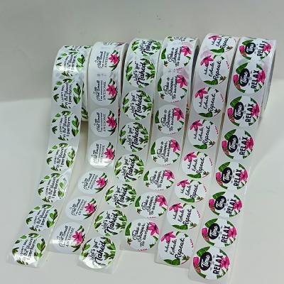 China Waterproof Custom Circle Stickers Roll Up Waterproof Round Vinyl Sticker Product Logo Label Printing for sale