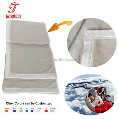 China 100% Polyester Fleece Disposable Airline Blanket, Airplane Blanket With Logo for sale