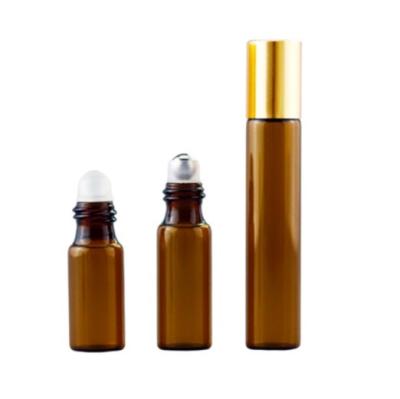 China 15ml Cosmetic High Quality Empty Amber Essential Oil Perfume Roll On Roller Glass Bottle With Steel Trackball for sale