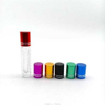 China High Quality Cosmetic 15ml Thick Bottom Empty Clear Roll On Glass Perfume Roller Bottle With Steel Roller for sale