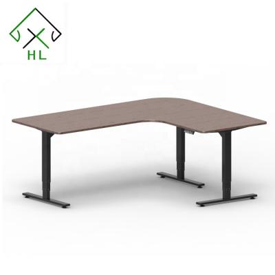 China (Height) Adjustable L Shaped Stand Up Electric Height Adjustable Standing Desk for sale