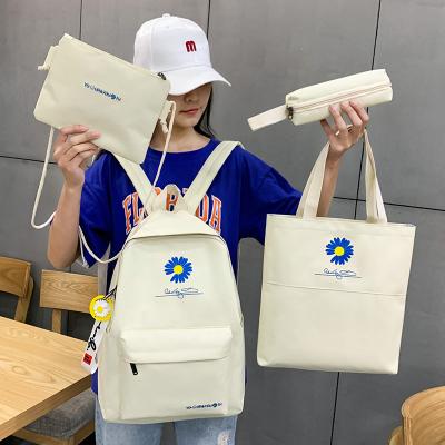 China Other new college student schoolbag female Korean version of the small fresh canvas daisy four-piece backpack large-capacity for sale