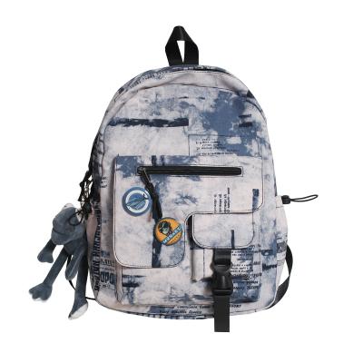 China New waterproof fashion backpack men's and women's backpack large capacity casual outdoor waterproof school bag for primary and secondary school for sale