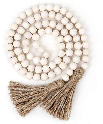 China Boho Decor 58in Garland Farmhouse Boho Decor Wooden Beads with Tassels for sale