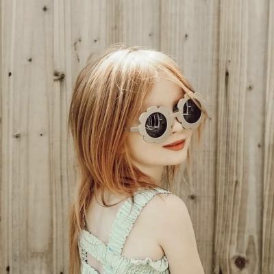 China Fashion Sunglasses Frosted Macaron Color Baby Sunglasses Children's Sunflower Shape Sunglasses For 1-8 Years Kids for sale