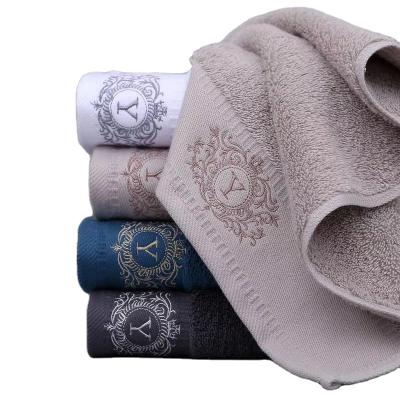 China Compressed Cotton Embroidery Custom Logo High End 100% Cotton Bath Towels for sale