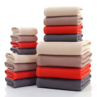 China Unique Design Child Safe Waffle Weave 100% Cotton Solid Color Bath Towels for sale