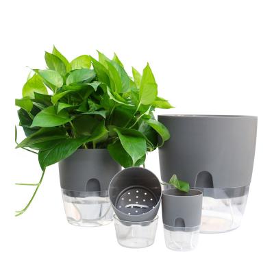 China Modern Automatic Water Planter Cotton Pots Rope Self Watering Clear Plastic Lazy Flower Pot for sale