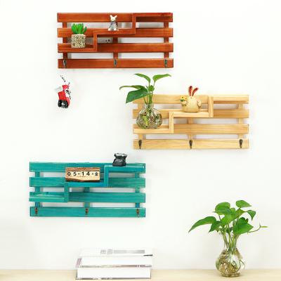 China Modern Solid Wood Stair Hook Wall Shelf Living Room Bedroom Wall Sundries Storage Organization Rack Te koop