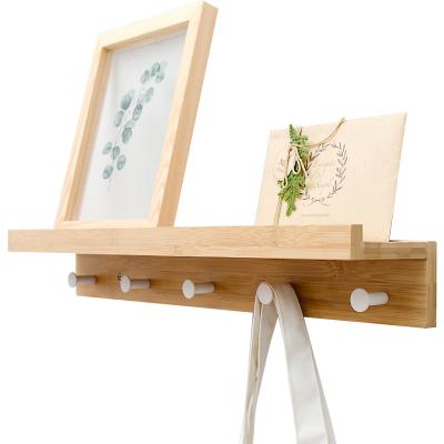 China Contemporary Creative Uniterm Divider Shelf Hook Rack Wall Mounted Bathroom Toilet Wall Bamboo Shelf Te koop