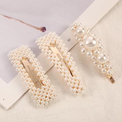 China Fashion Wholesale New Designs Luxury Pearl Hair Clip High Quality Attractive Hair Clip Accessories For Women for sale