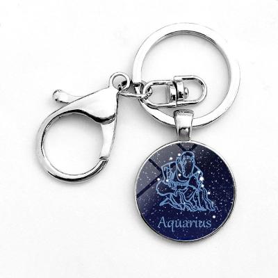 China Key Chain Horoscope Logo Metal Base Promotion Custom Wholesale 12 Metal Zodiac Pendant Keychains for sale