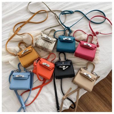 China Fashion Good Trendy Mini Women Handbag and Purses With Silver Metal Turn Lock Ins Multicolor Mini Sling Crossbody Bags Silver Ladies for sale