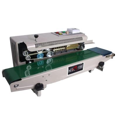 China Food Plastic Bag Sealer Price Nitrogen Packing Filling Sealing Machine for sale