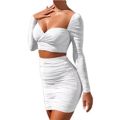 China Anti-pilling hot sale ladies knitting long sleeve ruched sexy crop top and tight skirt two piece sets for sale