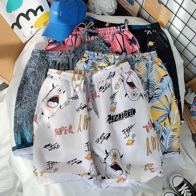 China Anti-wrinkle Summer New Men's Cartoon Shorts Trend Sports Men's Casual Pants Loose Beach Pants for sale