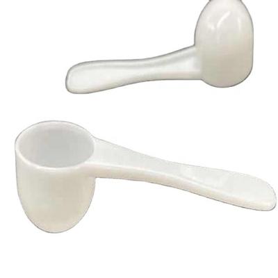 China Sustainable PP Plastic Measuring Cup , White Round Flat Bottom Milk Powder Spoon for sale