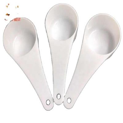 China Sustainable PP Plastic Measuring Cup , White Round Flat Bottom Milk Powder Spoon for sale