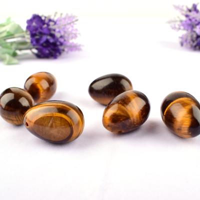 China Low Price Crystal Egg Tiger Eye Stone Natural Yoni Massage Eggs For Healing From China Sale for sale