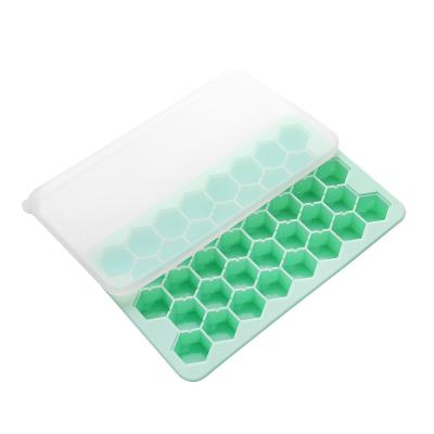 China 38 Grid Tray With Lid Sustainable Release Silicone Honeycomb Shaped Easy Ice Cube for sale