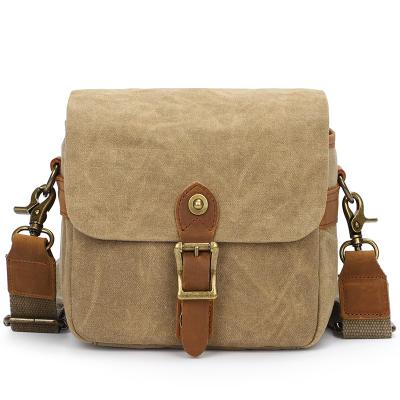 China Retro Waxed Canvas DSLR SLR Camera Bag Small Waterproof Single Shoulder Camera Bag For Sony A6000 A7R for sale