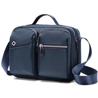 China Oem Polyester Material de Oxford Hombres Sling Bag a prueba de agua personalizado en venta