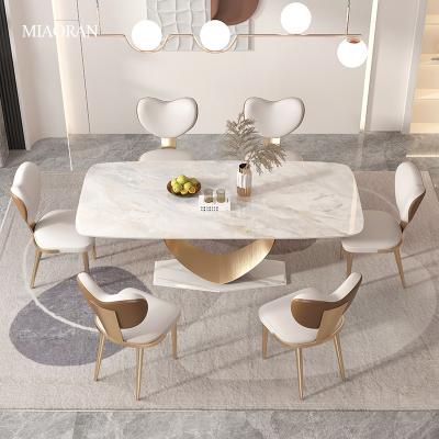 China Modern home furniture dining table sets chipped stone dining tables and dining table chairs for sale