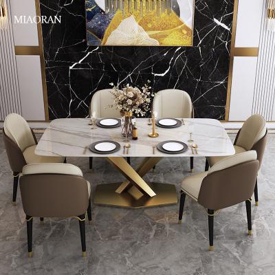 China Modern Modern Dining Table and Chairs Stainless Steel Dining Table Designs for sale