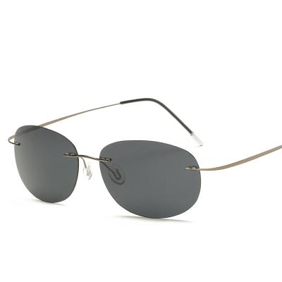 China Rimless Titanium Polarized Sunglasses Around Men Oval Sun Rimless Glass Designer Brand Sunshading Outdoor Sunglasses for Women Men for sale