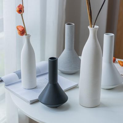 China Nordic modern minimalist fashion home ceramic dry flower supplier vase ware white ceramic vase for flower shop home decor for sale